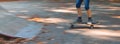 Panorama shot with motion blur of a child on a skateboard Royalty Free Stock Photo