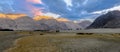 Panorama shot of mountain and blue sky in Hunder sand dunes, Nubra valley, Ladakh,india