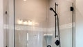 Panorama Shower stall with half glass enclosure and black shower head and handle