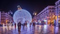 Panorama showing Christmas decorations with big ball on Luis De Camoes square night timelapse. Royalty Free Stock Photo