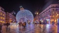 Panorama showing Christmas decorations with big ball on Luis De Camoes square night timelapse. Royalty Free Stock Photo