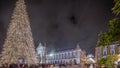 Panorama showing Commerce square illuminated and decorated at Christmas time in Lisbon night timelapse. Portugal Royalty Free Stock Photo