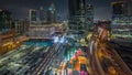 Panorama showing Dubai International Financial district aerial night . View of business and financial office towers. Royalty Free Stock Photo