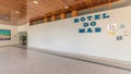 Panorama showing hotel entrance and door to lobby timelapse in the village of Sesimbra