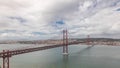 Panorama showing Lisbon cityscape and Tagus river timelapse with 25 of April bridge Royalty Free Stock Photo