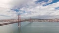 Panorama showing Lisbon cityscape and Tagus river timelapse with 25 of April bridge Royalty Free Stock Photo