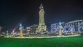 Panorama showing the Marques de Pombal square with monument and Christmas lights night timelapse. Lisbon, Portugal Royalty Free Stock Photo