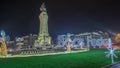 Panorama showing the Marques de Pombal square with monument and Christmas lights night timelapse. Lisbon, Portugal Royalty Free Stock Photo