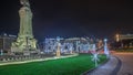 Panorama showing the Marques de Pombal square with monument and Christmas lights night timelapse. Lisbon, Portugal Royalty Free Stock Photo