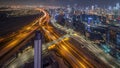 Panorama showing skyline of Dubai with business bay and downtown district night timelapse.