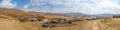Panorama of simple stone and tin huts in a village near Katse Dam in the mountain kingdom of Lesotho, Africa