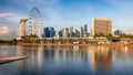 Panorama of Singapore city skyline at business modern downtown building area in sunrise with cloud and sun light and reflection Royalty Free Stock Photo