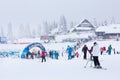 Panorama of ski resort Kopaonik, Serbia, skiers, pine trees