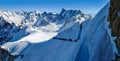 Panorama with skiers heading for Vallee Blanche, France Royalty Free Stock Photo