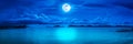 Panorama of sky with full moon on seascape to night. Royalty Free Stock Photo