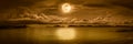 Panorama of sky with full moon on seascape to night. Royalty Free Stock Photo