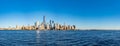 Panorama of skyline of downtown Manhattan over Hudson River under blue sky, in New York City, USA Royalty Free Stock Photo