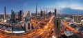 Panorama of skyline Dubai with Butj Khalifa - Aerial view at night, United Arab Emirates Royalty Free Stock Photo
