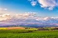 Panorama of Slovakia Tatras mountains in spring. Grass fields Royalty Free Stock Photo