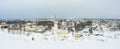 Panorama of a small city in the depths of Russia from a height. Orthodox churches and traditional old wooden houses Royalty Free Stock Photo