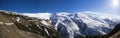 Panorama of snow mountain landscape with blue sky Royalty Free Stock Photo