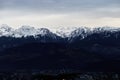 Panorama of snowing mountains of Alps at evening Royalty Free Stock Photo