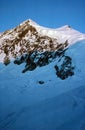 Panorama of snowy mountains and high alpine peaks in wintery Bernese Oberland in Switzerland Royalty Free Stock Photo