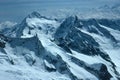 Panorama of snowy mountains and high alpine peaks in wintery Bernese Oberland in Switzerland Royalty Free Stock Photo