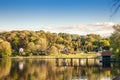 Panorama of Sotsko Jezero, or lake Sot, in Fruska Gora, in Serbia, Europe, in summer, at dusk, into the light with cabins