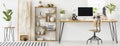 Panorama of a spacious home office interior with a bookcase with