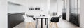 Spacious kitchen with dining area, panorama Royalty Free Stock Photo