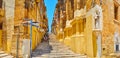 Panorama of St John street with St Anthony statue, Valletta, Malta