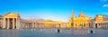 Panorama of St. Peter`s Square illuminated by the first rays of the morning sun