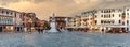 Panorama of the St. Stephen`s square and the statue of Nicolo Tommaseo in Venice at evening, Italy Royalty Free Stock Photo