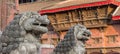 Panorama of stone lion sculptures on Durbar square in Kathmandu Royalty Free Stock Photo