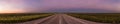 panorama of a straight road through the outback of Australia, after a beautiful sunset, Nothern territory