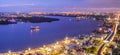 Panorama Street lights and street lighting from residential houses in the suburbs during sunset time, boat traffic on the Chao