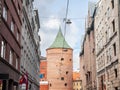 street of the old rica (vecriga) in latvia with a focus on the Riga powder tower, also called pulvertornis. It\'s a