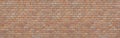 Panorama  Structural red  Brick Wall. Panoramic Solid Surface. stone background.   brick wall  texture background wild and high Royalty Free Stock Photo