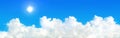 panorama of sun shines with white cloud on blue sky Royalty Free Stock Photo