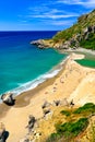 Panorama of sunny day at Preveli beach, Crete island, Greece. Royalty Free Stock Photo