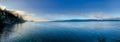 Panorama of the sunrise along the beautiful shorelines of the Gulf Islands off the shores of Vancouver Island Royalty Free Stock Photo