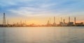 Panorama sunrise over oil refinery river front