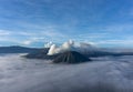 Panorama sunrise view of Mount Bromo, still active volcano and part of the Tengger massif with mist and cloud from vocalno crater Royalty Free Stock Photo