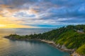 Panorama sunset above Promthep cape is a mountain of rock that extends into the sea in Phuket Thailand.