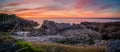 Panorama of a sunset on the beach and ocean at la torche in bretagne Royalty Free Stock Photo