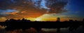 Panorama sunset beautiful colorful landscape and silhouette tree mountain river reflect in sky twilight time Royalty Free Stock Photo