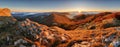 Panorama of sunset in a Carpathian mountain valley with wonderfu