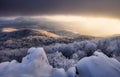 Panorama sunset colored sky winter snow clouds in Slovakia nature landscapes. Mountain sunset sky zoom in peak Vapenna frost