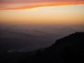 Panorama sunset of mountains hills layers landscape from Monte Naranco Sagrado Corazon statue hill Oviedo Asturias Spain